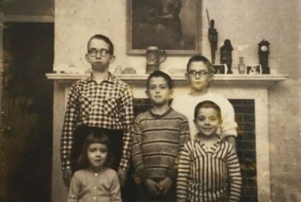 Crandell kids in fron of fireplace