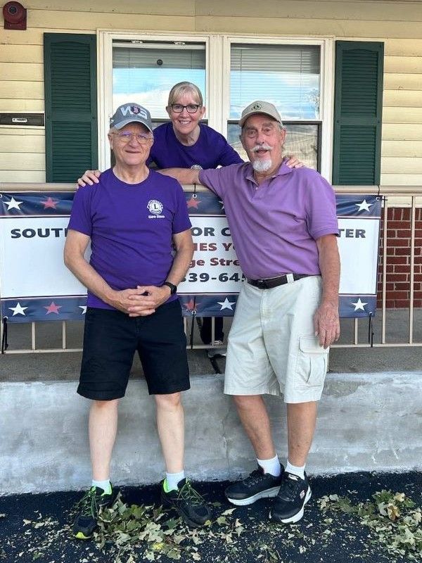 polly, steve, and timmy helpiing at senior center after the tornado