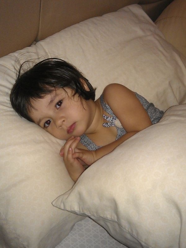 A sleepy Alba in bed