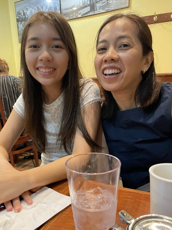 Cher and Alba happily eating breakfast at the NY Luncheonette