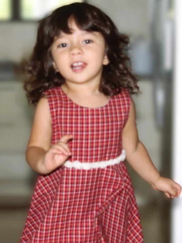 Alba still with curls